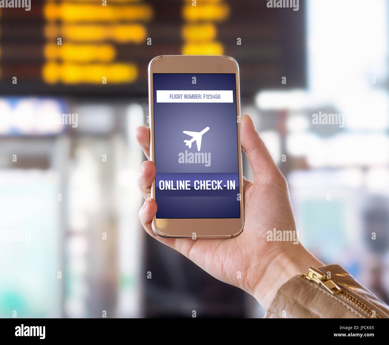 Online check in with mobile phone in airport. Woman checking in to flight with smartphone on the web. Internet self service provided by airline. Stock Photo
