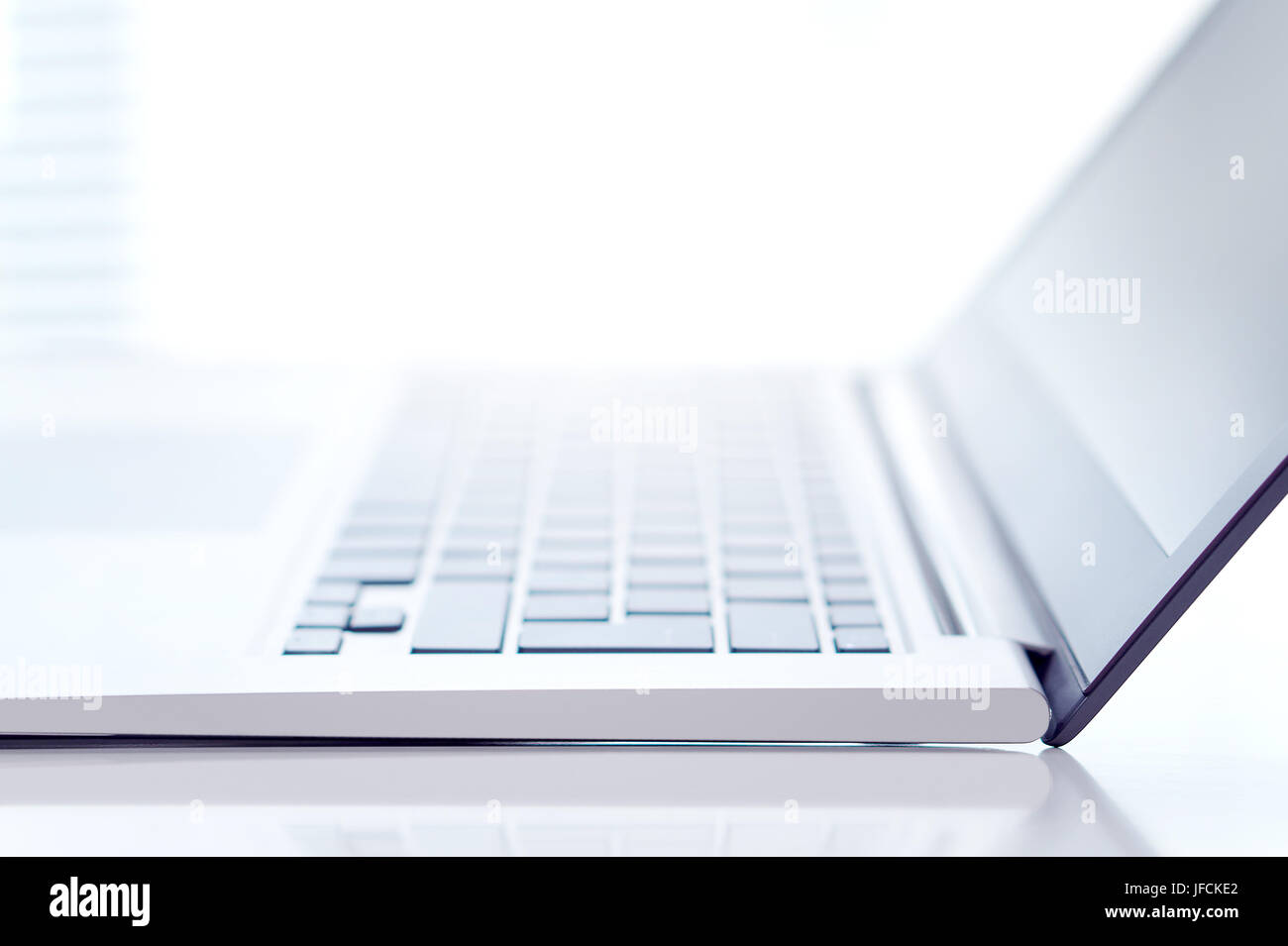 Modern marketing, small business and technology background. Close up of a blurry laptop with free empty blank copy space for text or content. Dynamic Stock Photo