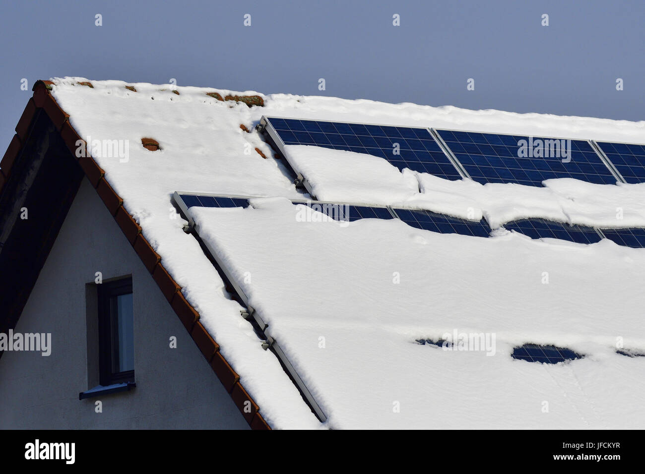 Solar panels with snow Stock Photo
