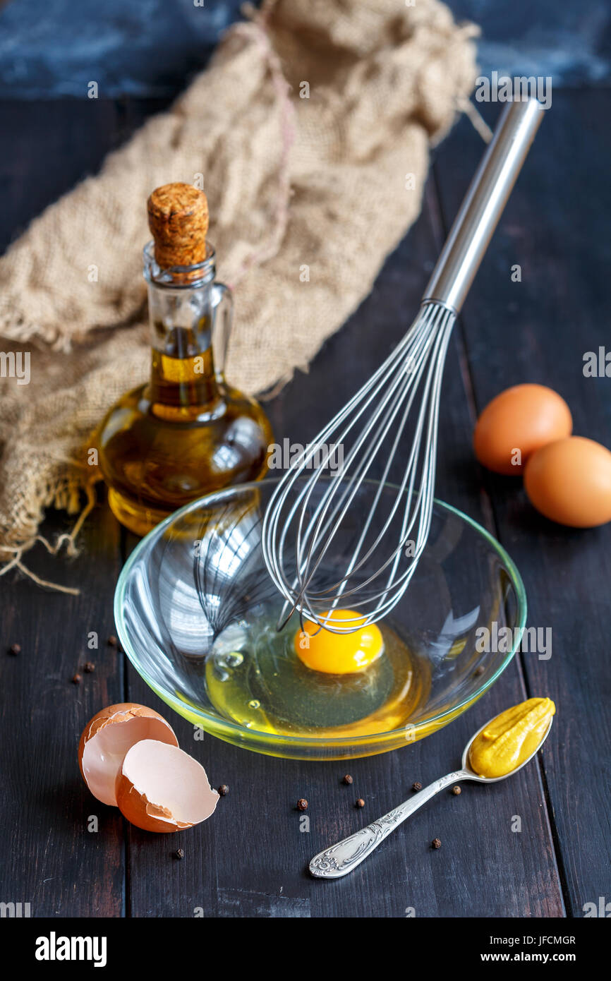 Cooking homemade mayonnaise sauce. Stock Photo