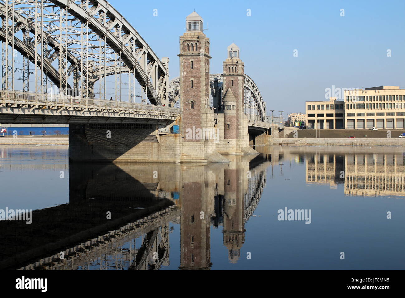 Bridge reflected in water Stock Photo