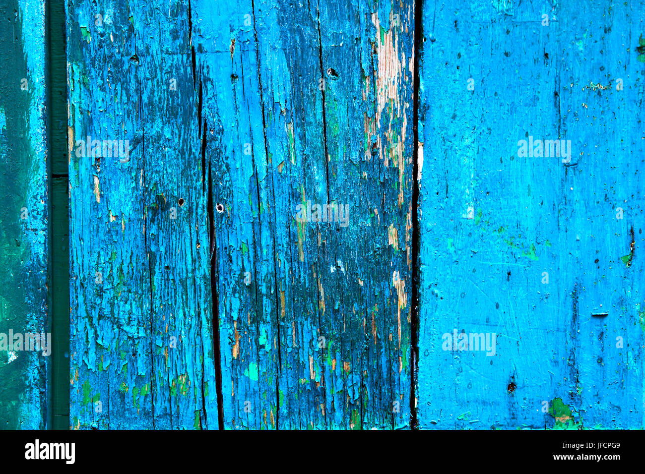 Vintage boards with peeling blue paint - texture or background Stock Photo