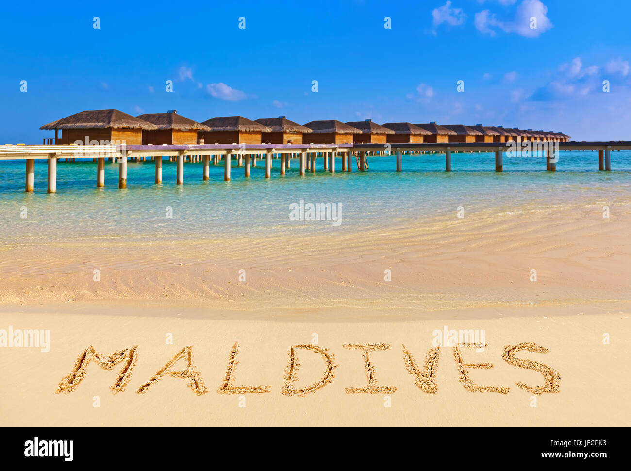 Word Maldives on beach Stock Photo