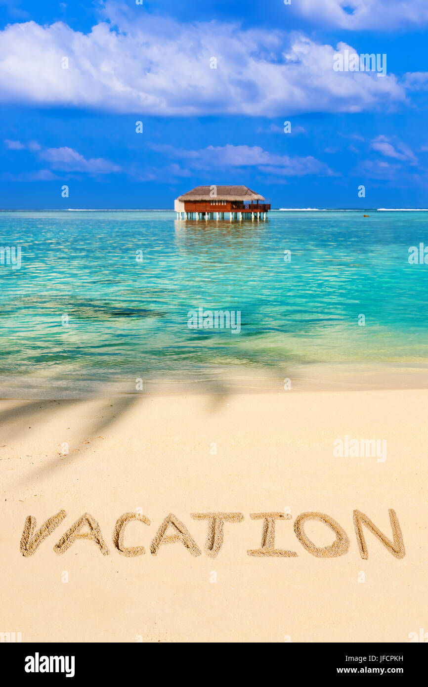 Word Vacation on beach Stock Photo