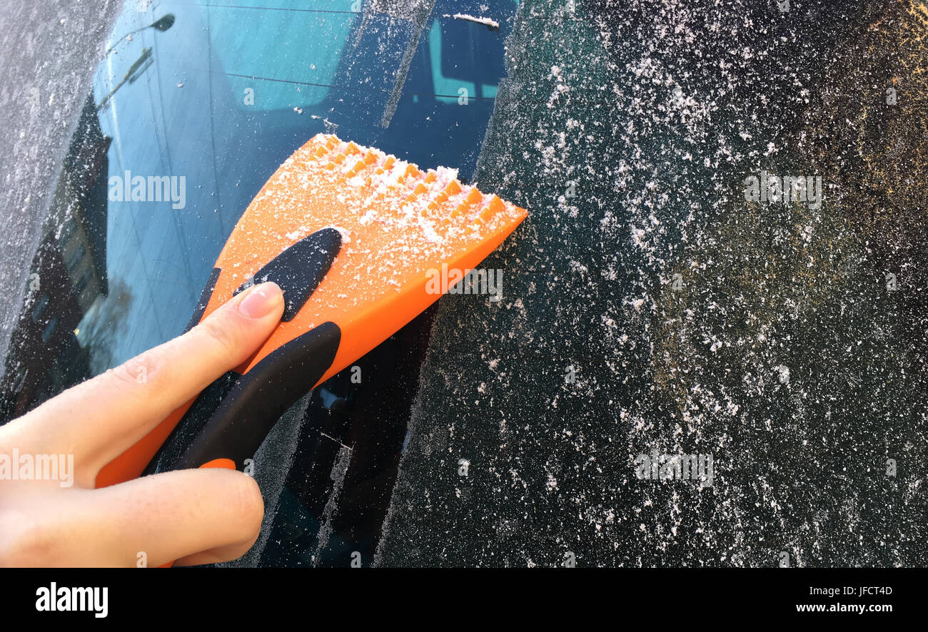 Scraping Car Windshield Stock Photo Alamy