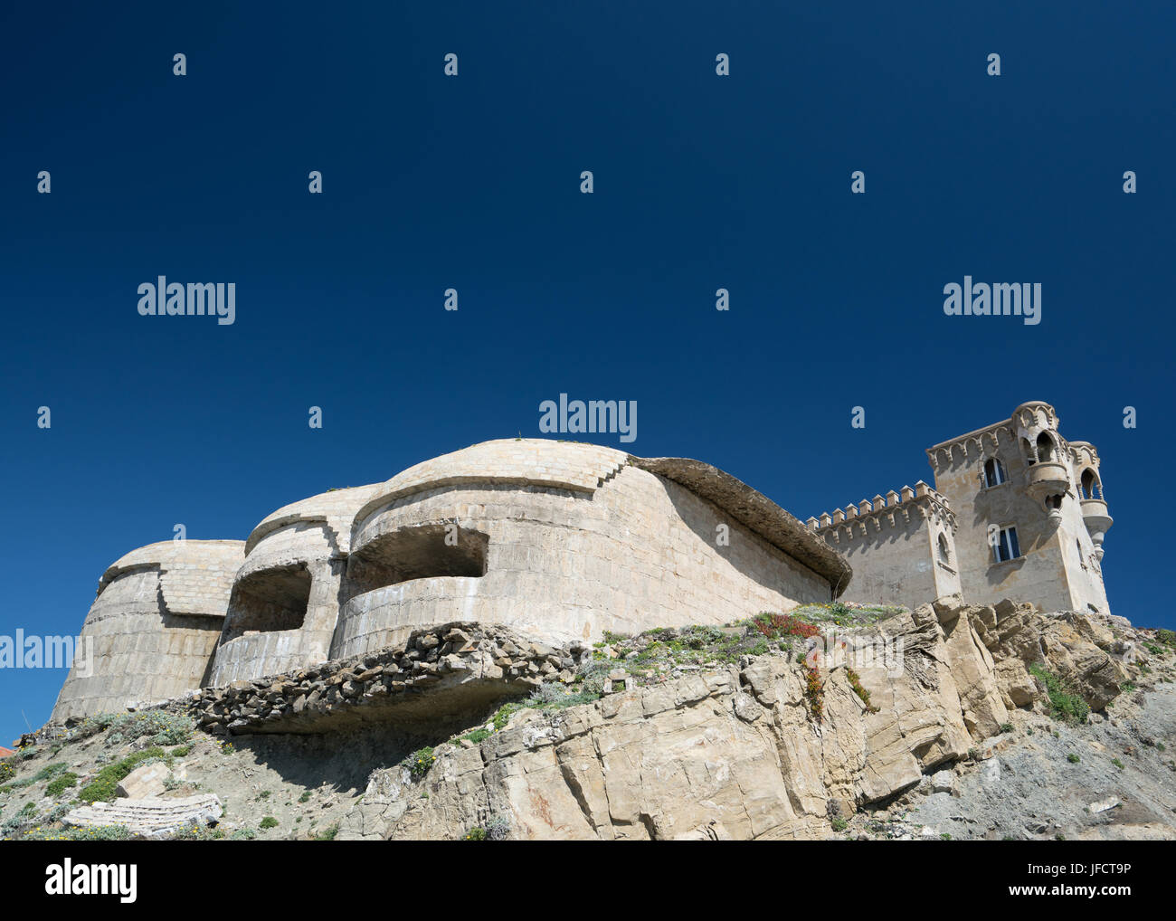 Castle of Guzmán the Good with defensive towers on the coast of Tarifa, Spain Stock Photo