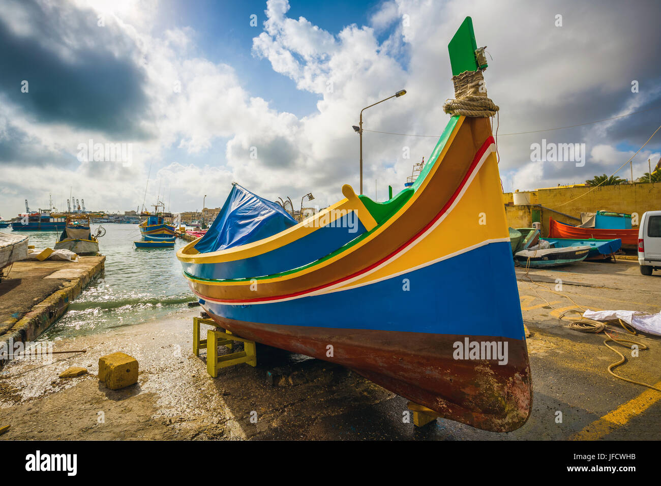 Marsaxlokk, Malta - Traditional Luzzu fisherboat at the famous market ...