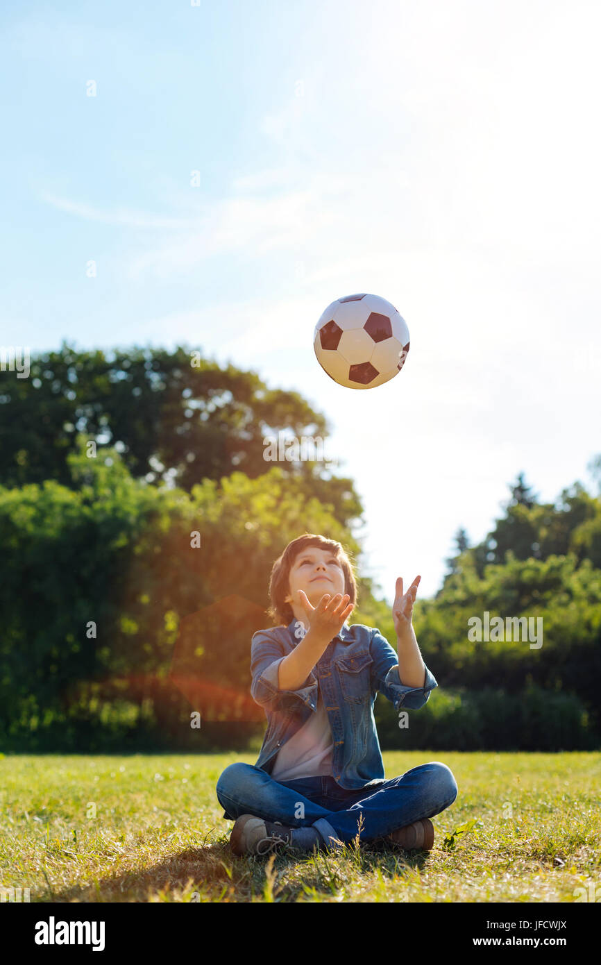 kid throwing ball