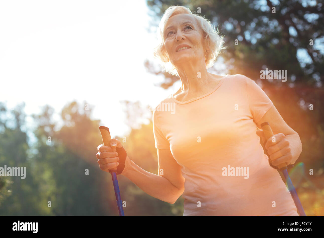 Mature woman nordic walking hi-res stock photography and images - Alamy