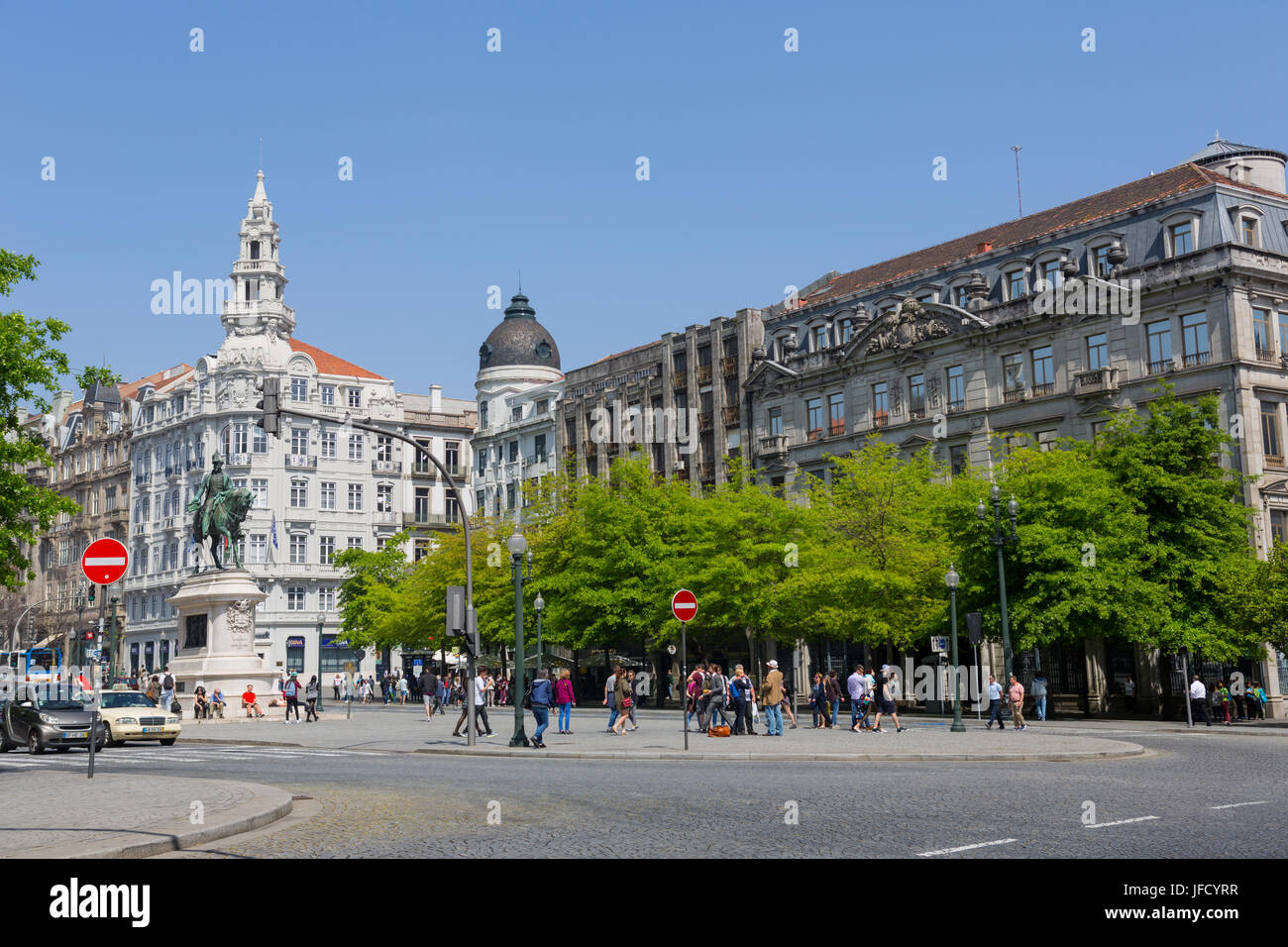 PORTO, PORTUGAL - April 17, 2017: People walking at Old Town streets of Porto. Porto is the famous tourist destiantion in Portugal Stock Photo