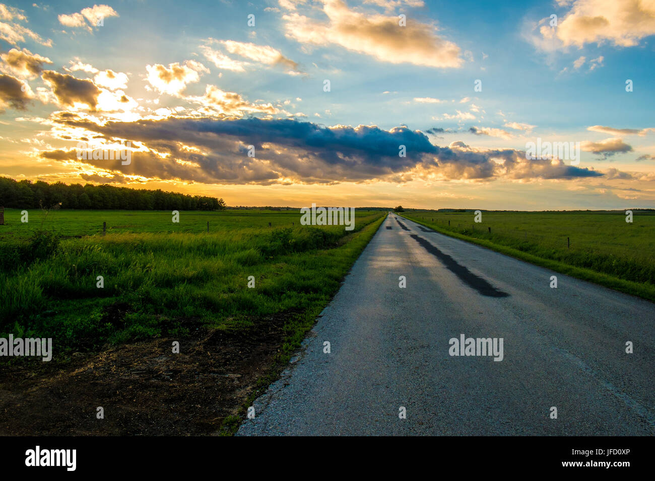 Asphalt road and sky Stock Photo - Alamy