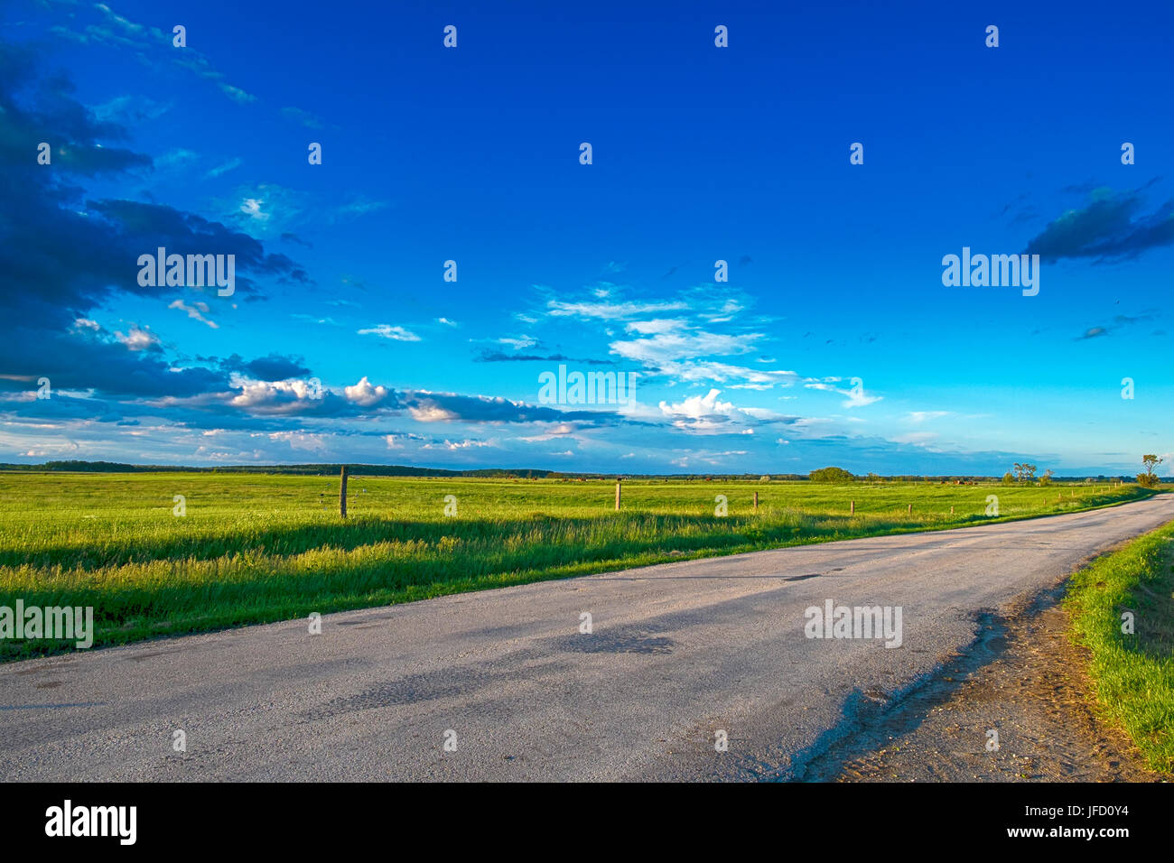 Asphalt road and sky Stock Photo - Alamy