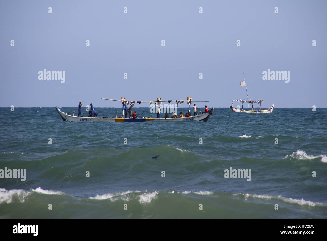 Fishing boats at work Stock Photo