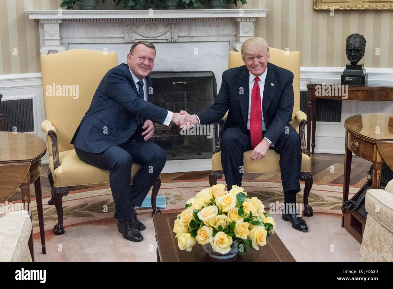 President Donald Trump shakes hands with Danish Prime Minister Lars ...