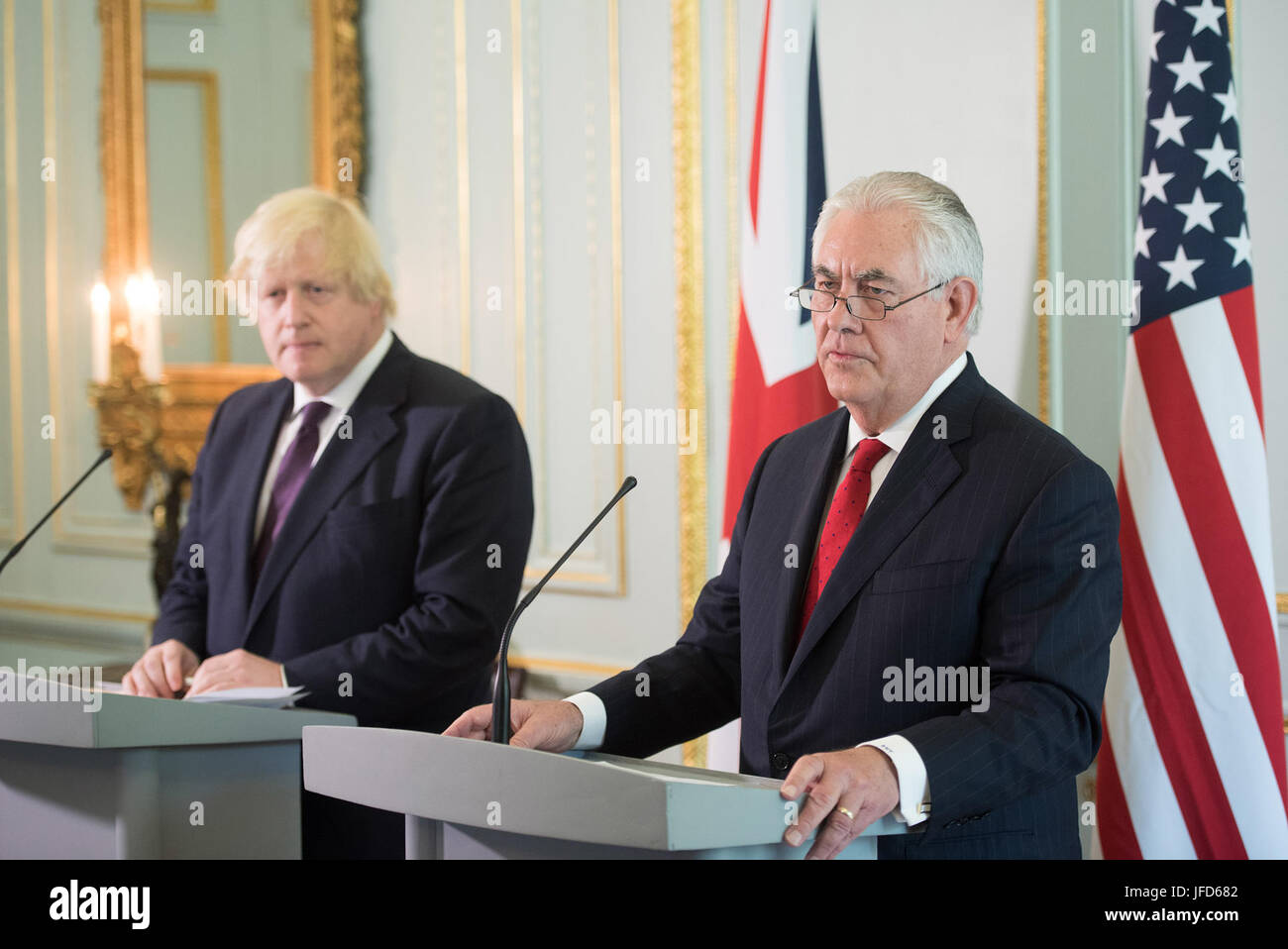 U.S. Secretary of State Rex Tillerson and British Foreign Secretary Boris Johnson address reporters gathered in Carlton House in London, United Kingdom, on May 26, 2017. Stock Photo