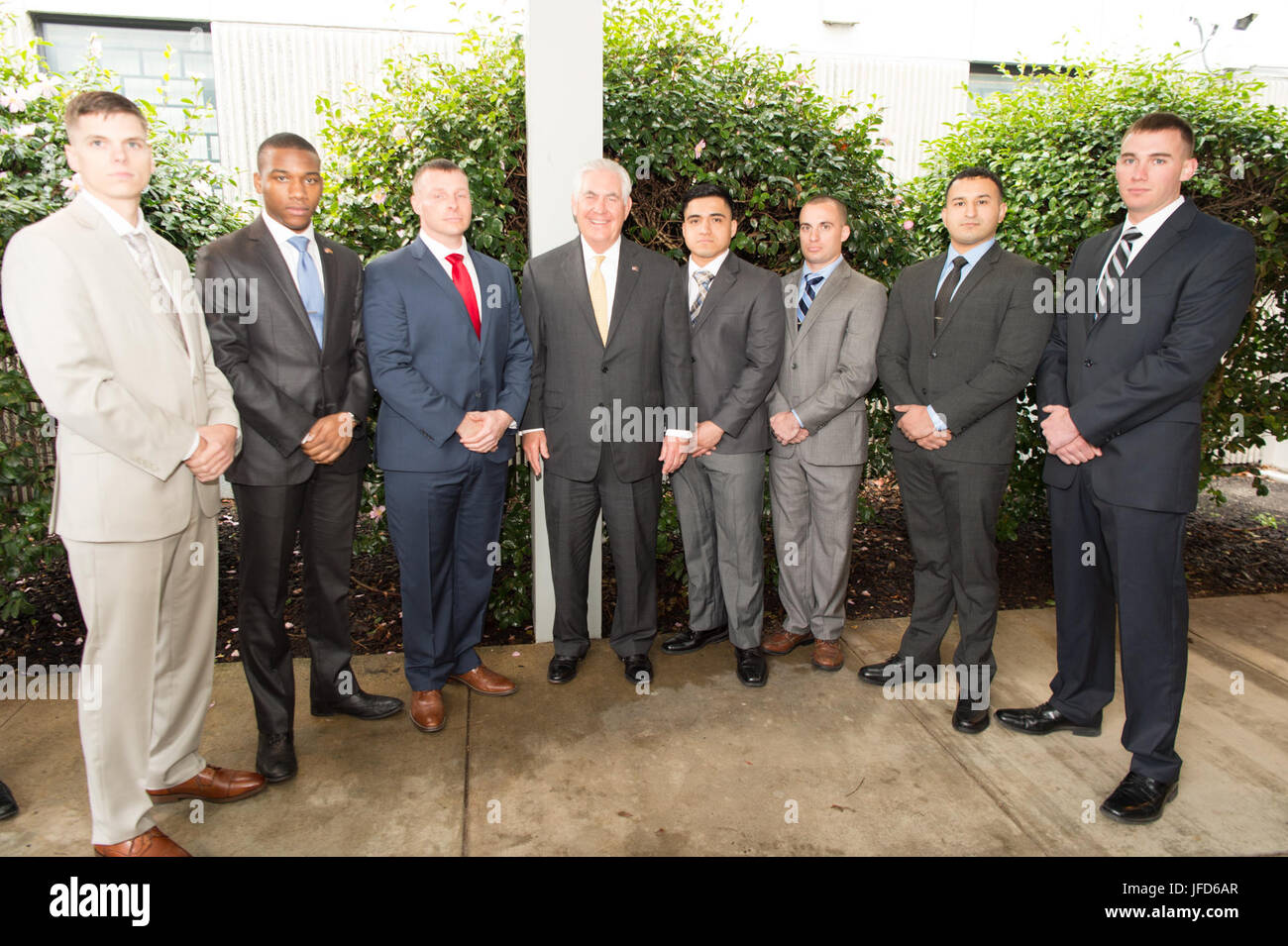 U.S. Secretary of State Rex Tillerson takes a photo with the Marine Security Guard Detachment at the U.S. Embassy in Wellington, New Zealand, on June 6, 2017. Stock Photo