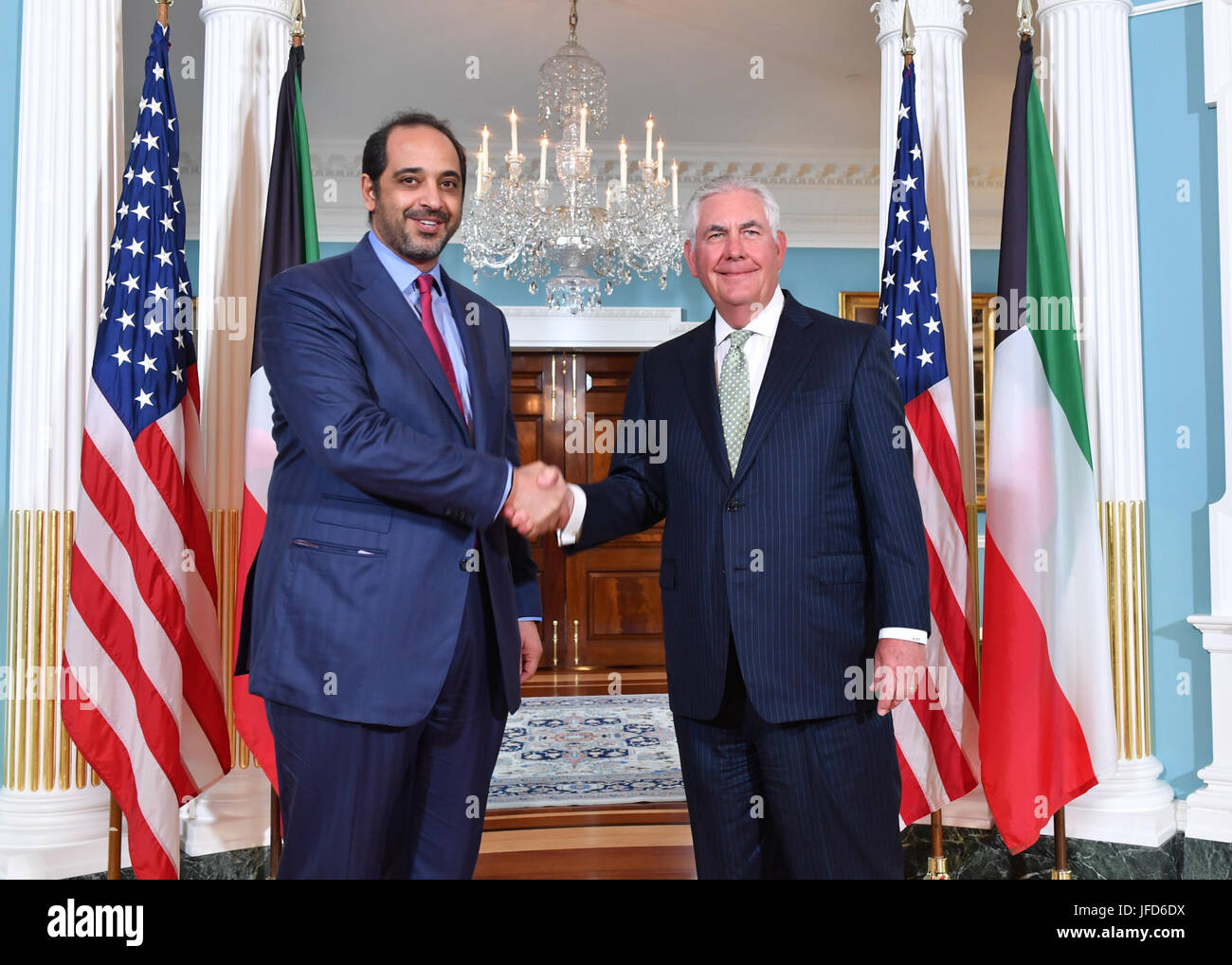 U.S. Secretary of State Rex Tillerson poses for a photo with Kuwaiti Minister of State for Cabinet Affairs and Acting Minister of Information Sheikh Mohammad Abdullah Al-Sabah before their meeting at the U.S. Department of State in Washington, D.C., on June 27, 2017. Stock Photo