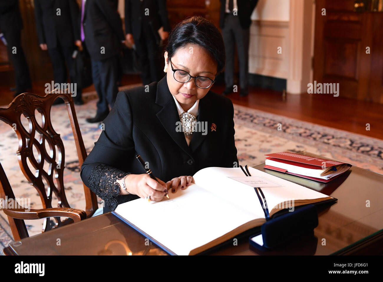 Indonesian Foreign Minister Retno Marsudi signs U.S. Secretary of State Rex Tillerson's guestbook before their bilateral meeting at the U.S. Department of State in Washington, D.C., on May 4, 2017. Stock Photo