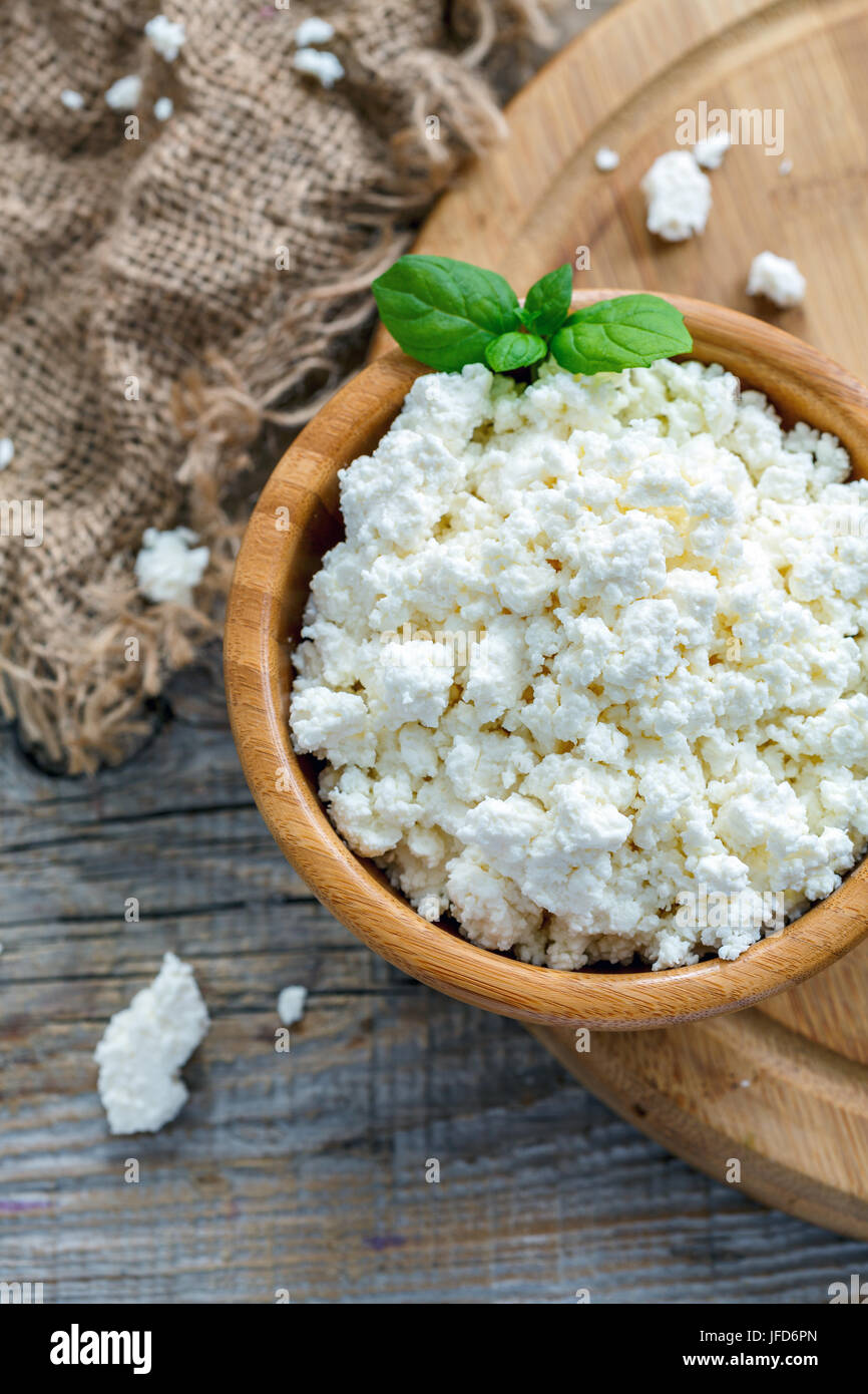 Wooden bowl with cottage cheese Stock Photo Alamy