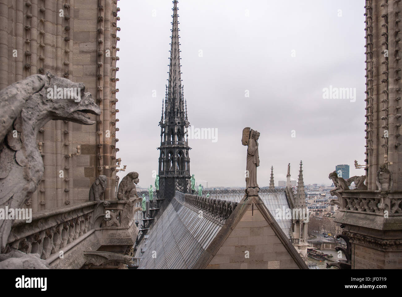 Angel and many gargoyles Stock Photo Alamy