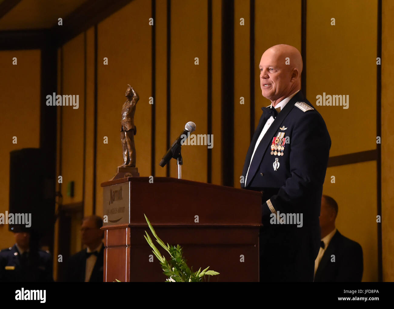 Air Force Gen. John “Jay” Raymond, commander of Air Force Space Command, speaks to the audience at the Air Force Association's 43rd Annual Salute to SMC Banquet, held in El Segundo Calif., June 09, 2017.  Gen. Raymond was awarded the General Bernard A. Schriever Space Leadership Award, presented by space pioneer Gen. General Bernard A. Schriever's great-grandson, Senior Amn. Brett Schriever.   (U.S. Air Force photo/Sarah Corrice.) Stock Photo