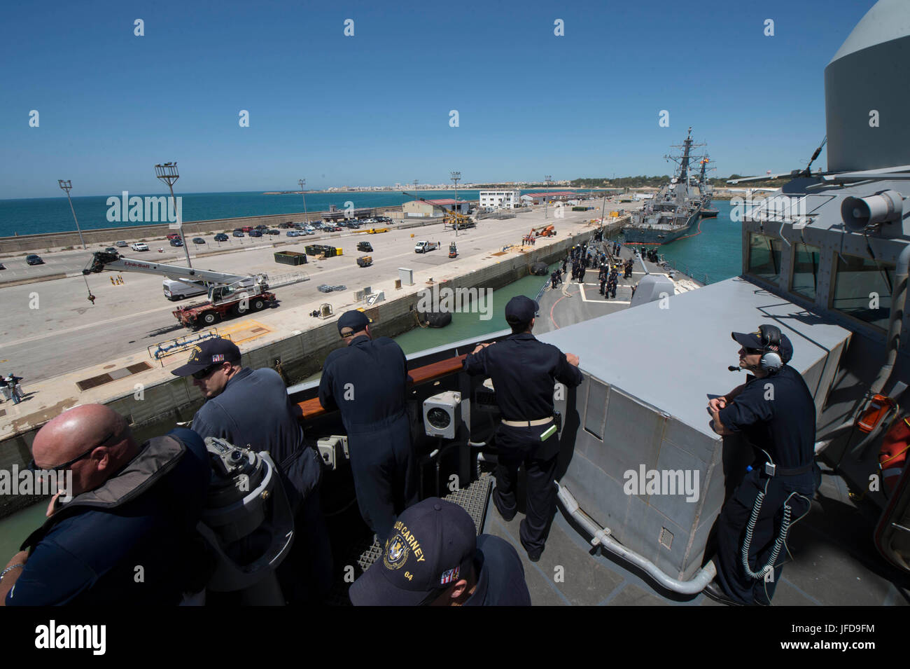 USS Carney, an Arleigh Burke-class guided-missile destroyer, departs ...