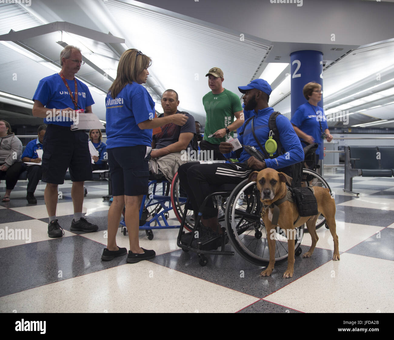 CHICAGO (June 28, 2017) From left, United Airlines volunteers assist
