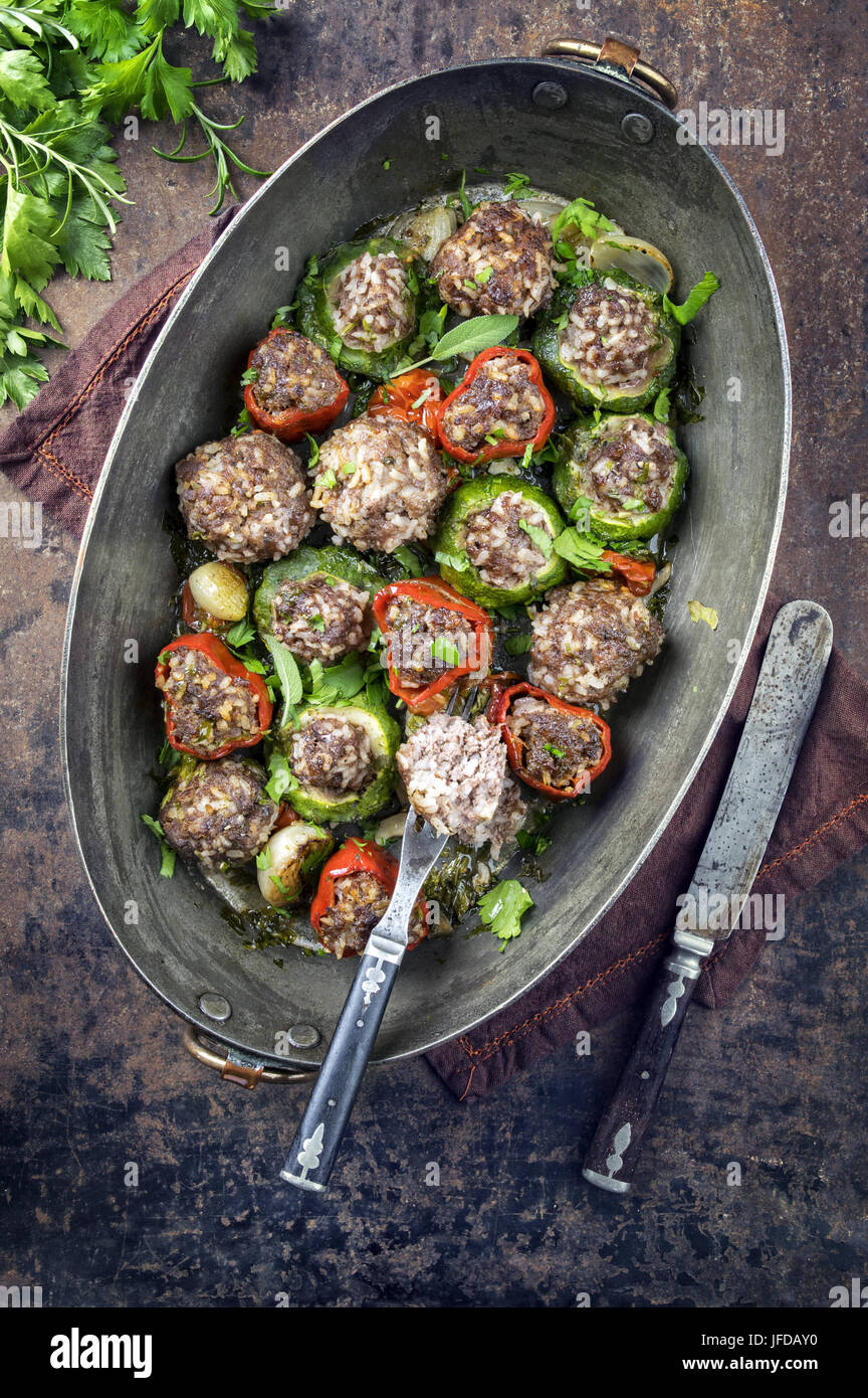 Rice Meatballs with Vegetable in Copper Pot Stock Photo