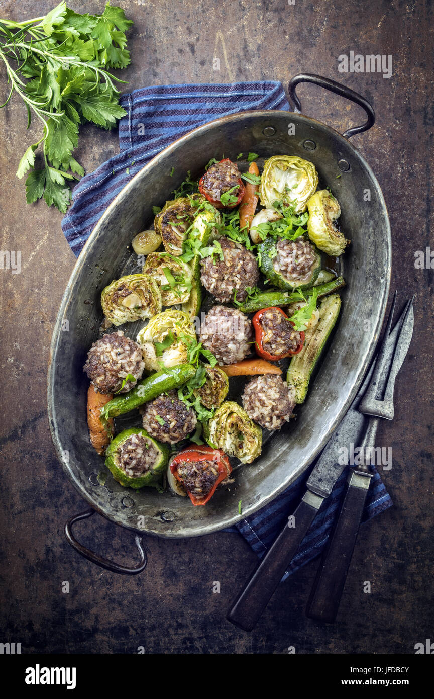 Rice Meatballs with Vegetable in Copper Pod Stock Photo