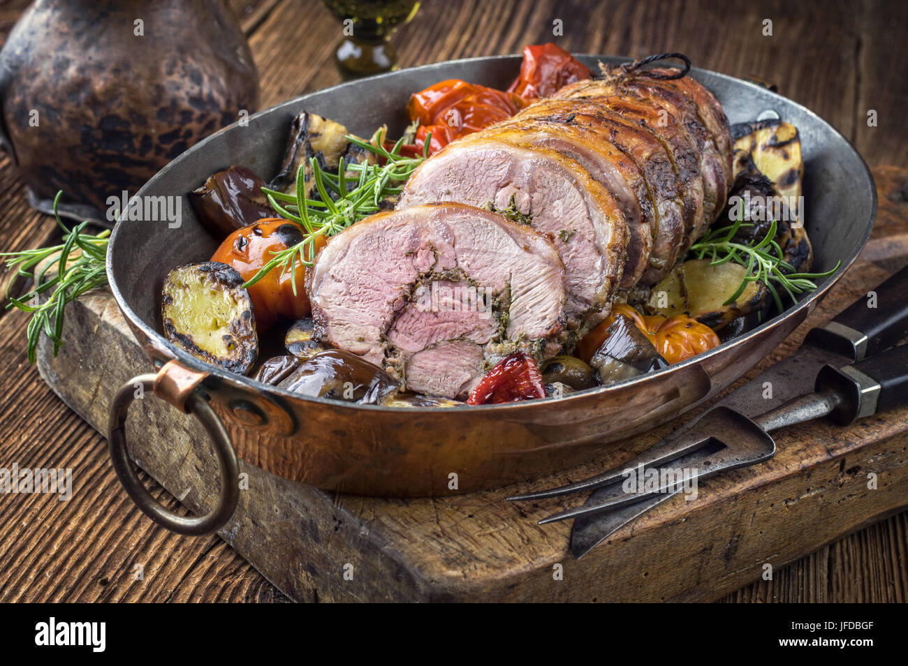 Rolled Lamb Roast with Barbecue Vegetable Stock Photo Alamy