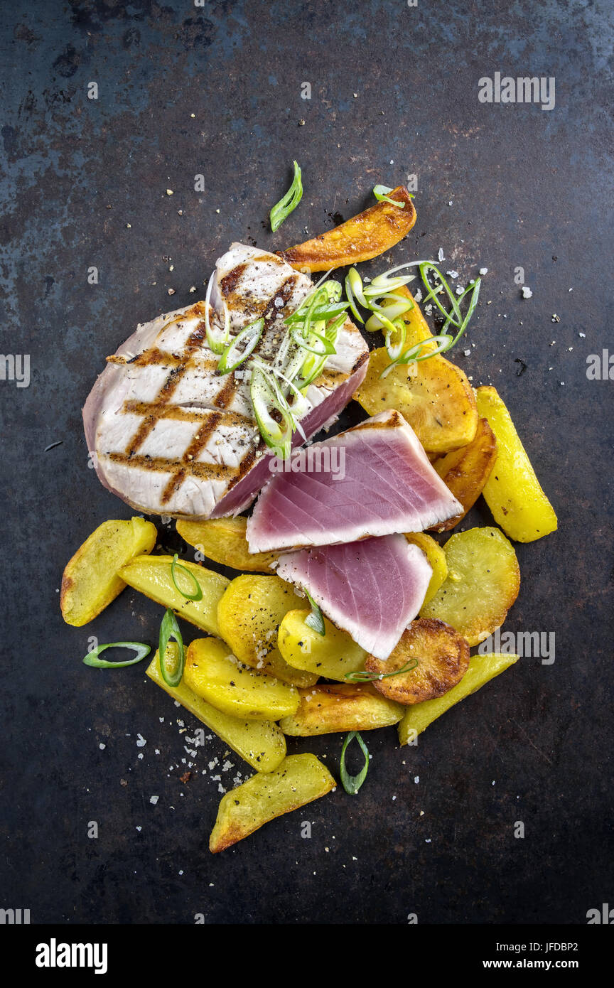 Tuna Steak with Hash Browns Stock Photo Alamy