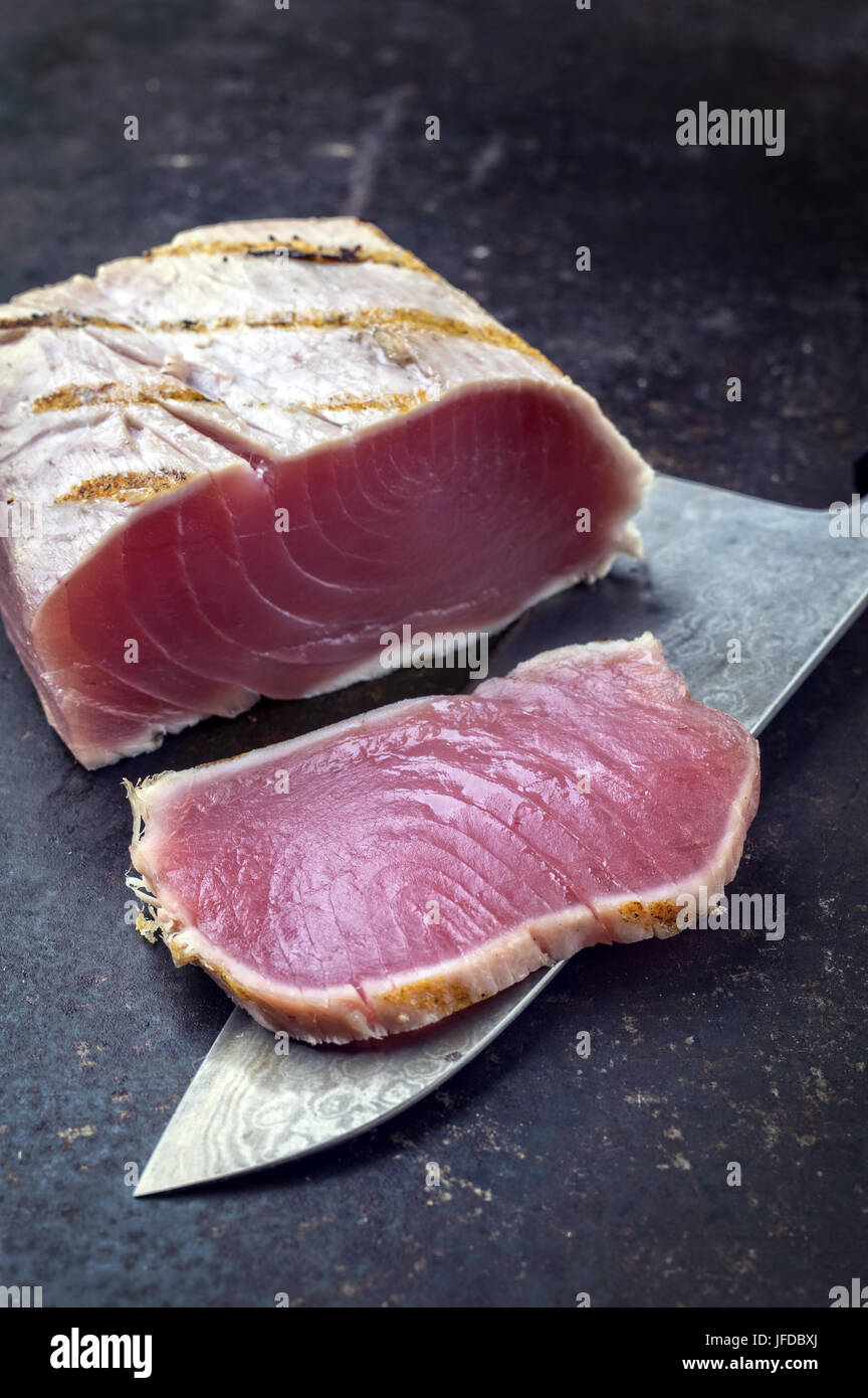 Tuna Tataki Steak on old Sheet Stock Photo Alamy