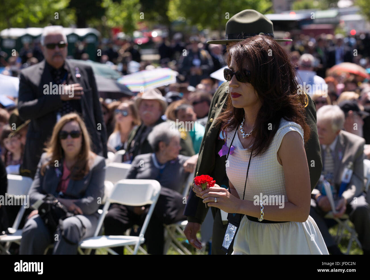 A family member of fallen U.S. Border Patrol Agent David Gomez ...
