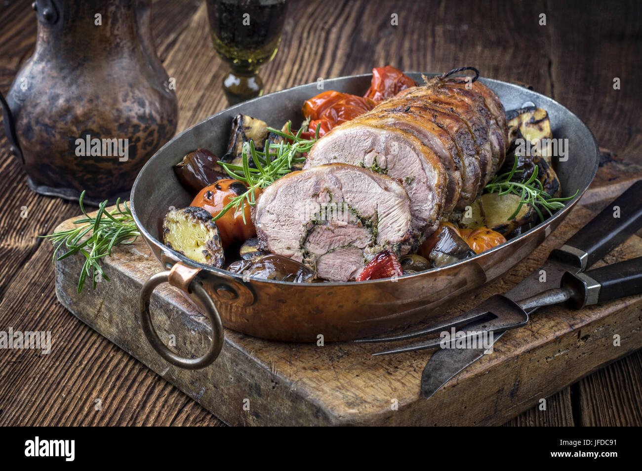 Rolled Lamb Roast with Barbecue Vegetable Stock Photo - Alamy