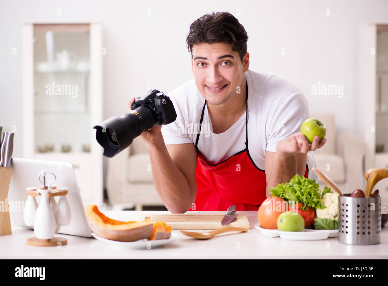 Food Blogger Photo Food blogger working in the kitchen Stock Photo - Alamy