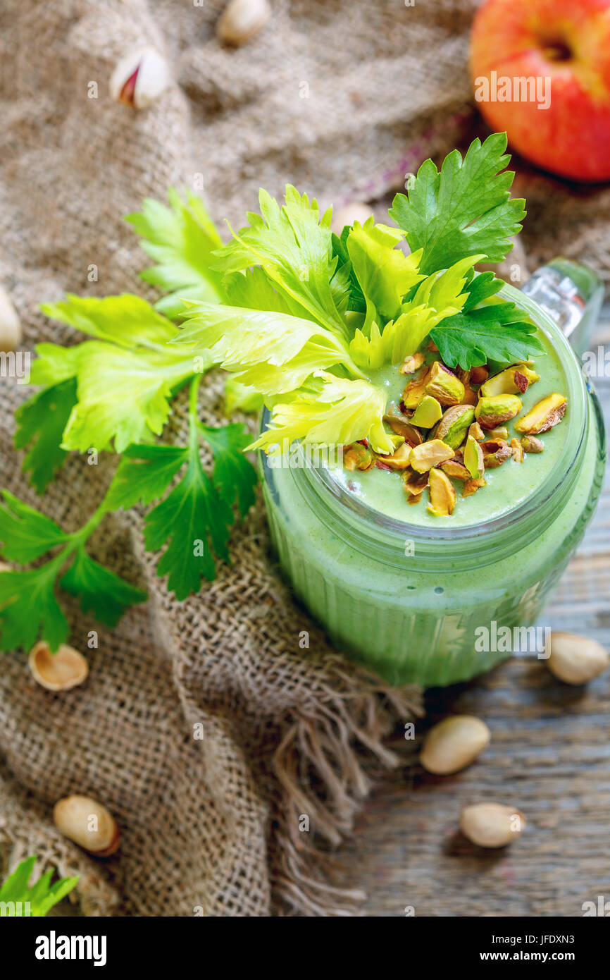 Green smoothie with banana, spinach, celery and apple Stock Photo Alamy