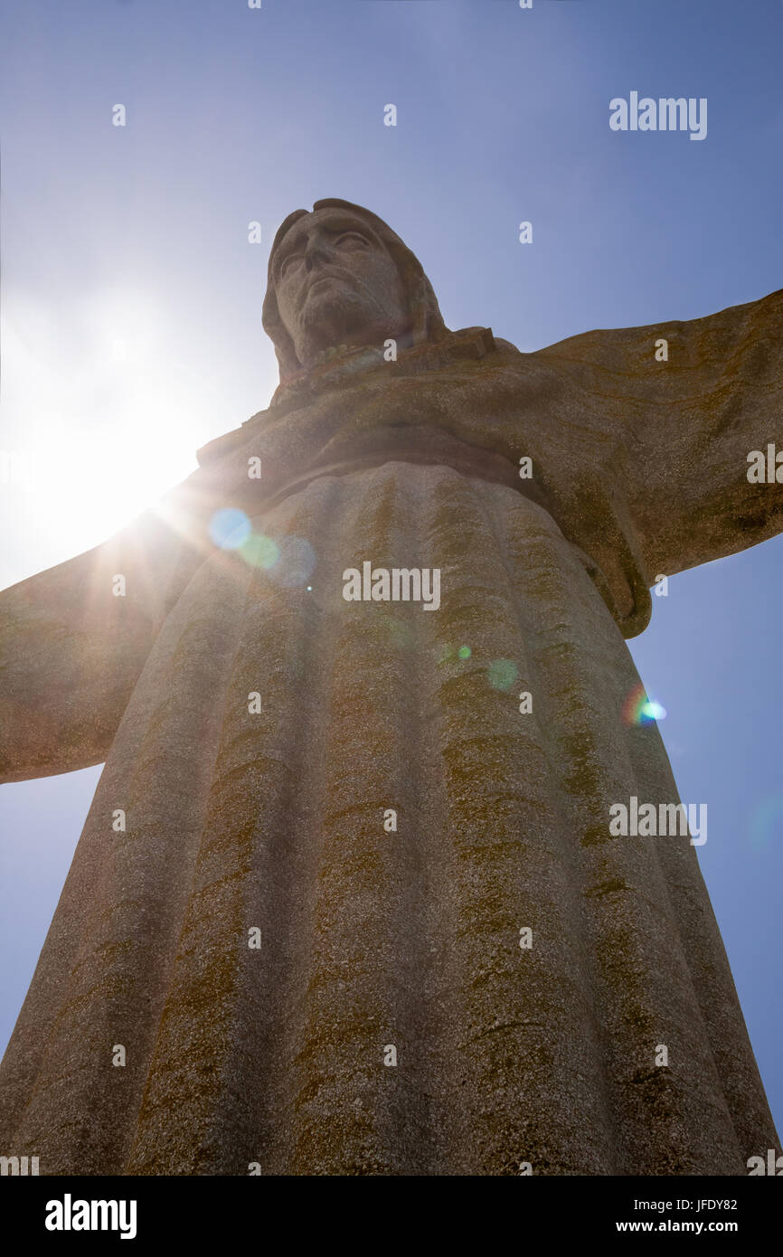 Sun behind Christus Rei Statue in Lisbon, Portugal, Europe Stock Photo ...