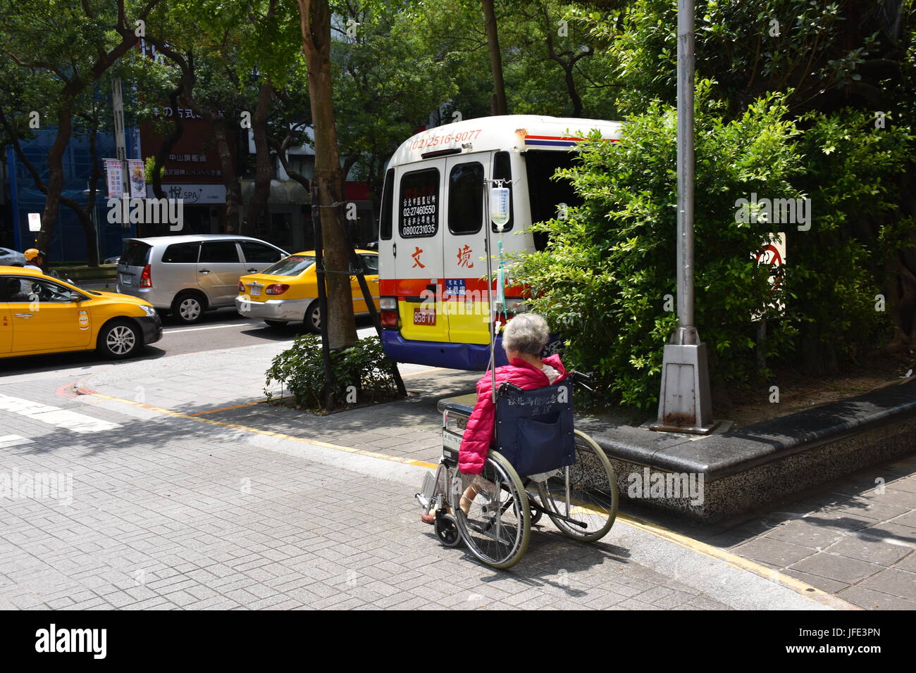 Elderly wheelchair taxi hires stock photography and images Alamy