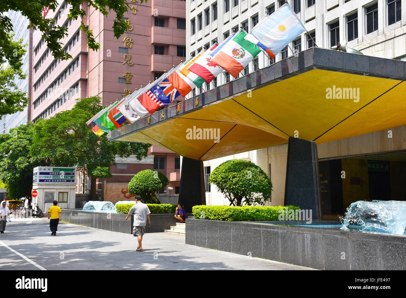 Some country flags blowing in the wind near the Mackay Hospital in Taipei , Taiwan Stock Photo