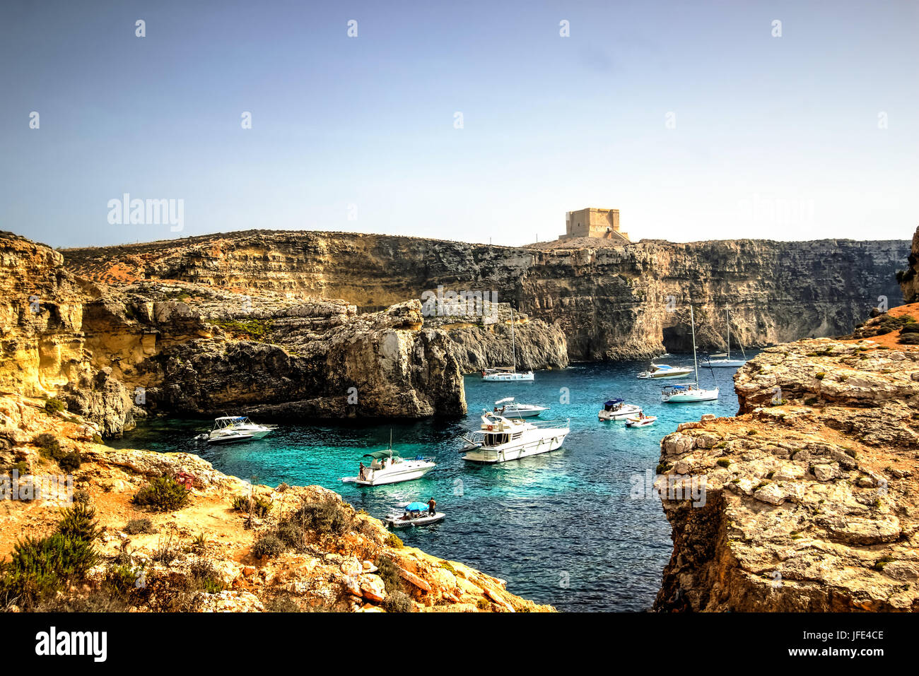 Yachts and leisure boats moored on the blue lagoon of Comino Island, Malta. Stock Photo