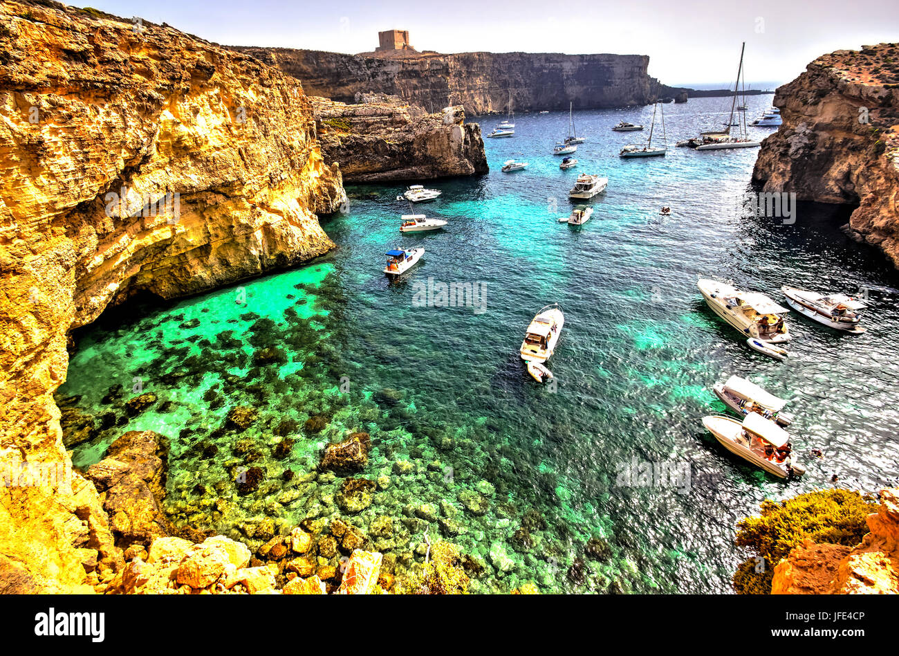 Yachts and leisure boats moored on the blue lagoon of Comino Island, Malta. Stock Photo