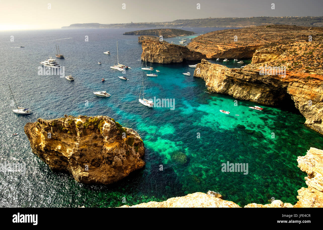 Yachts and leisure boats moored on the blue lagoon of Comino Island, Malta. Stock Photo