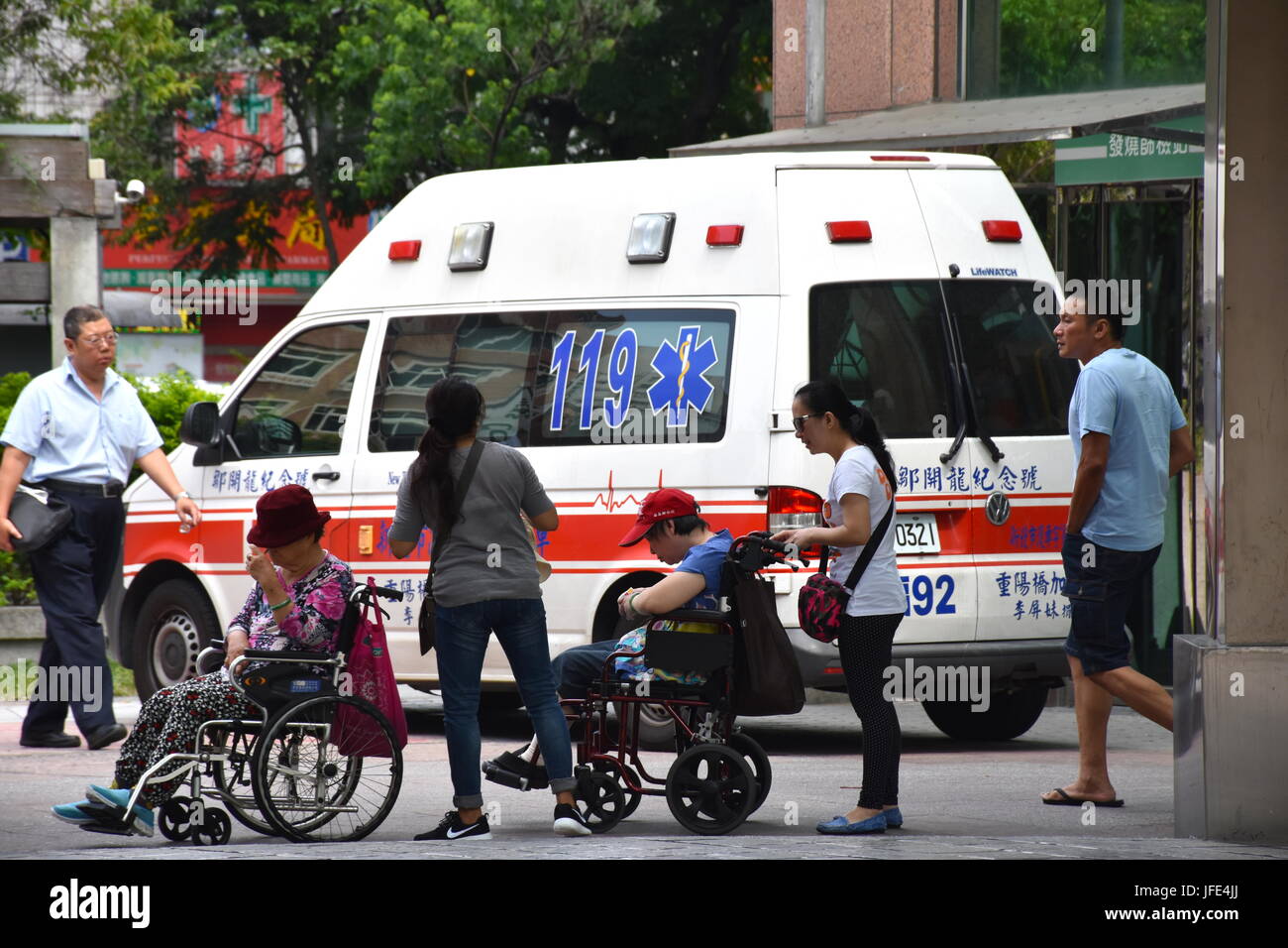 Ambulances parked outside the front entrance to Mackay Hospital, Taipei, Taiwan. Some were