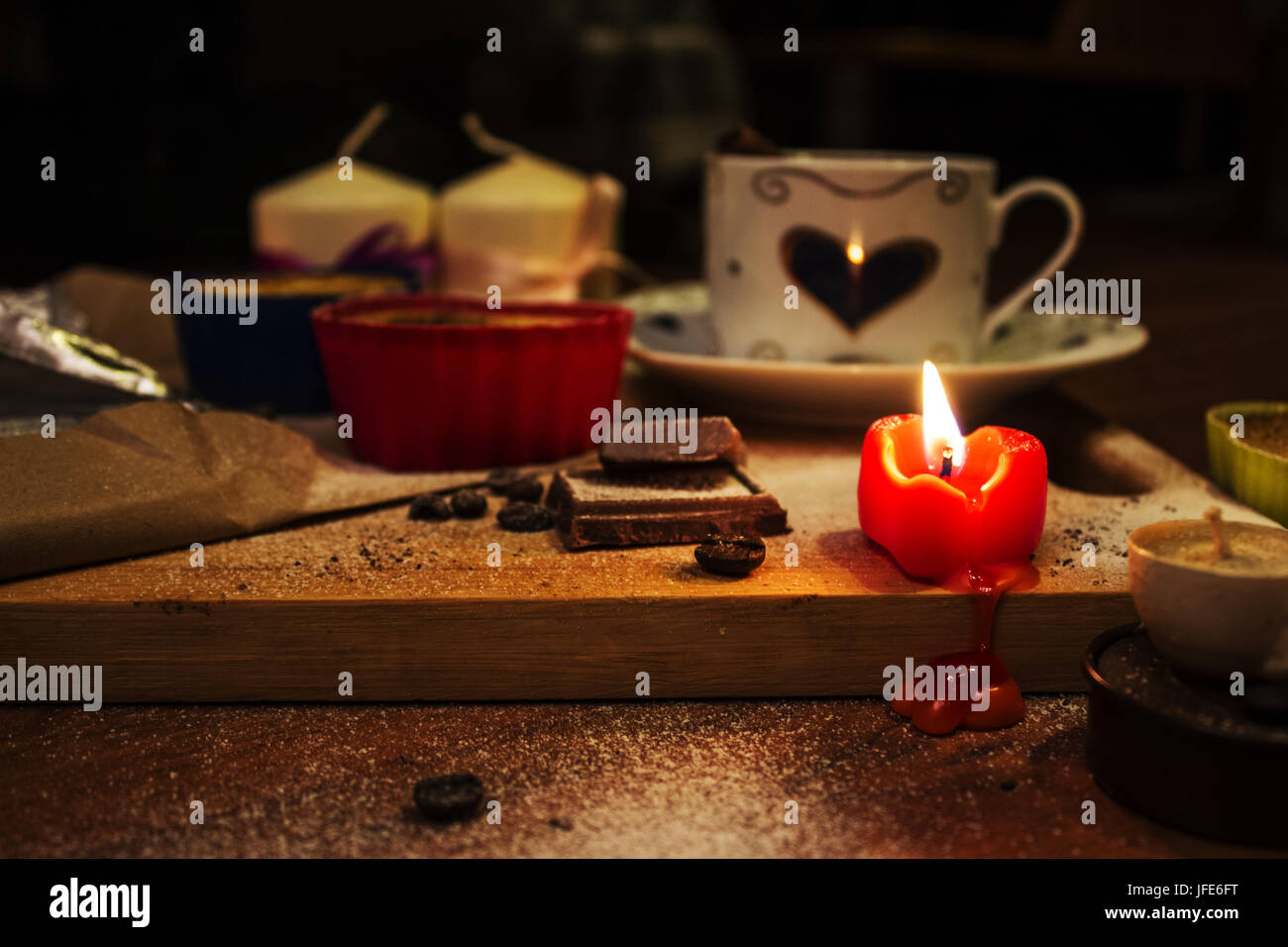 The candle burns and melts Stock Photo Alamy