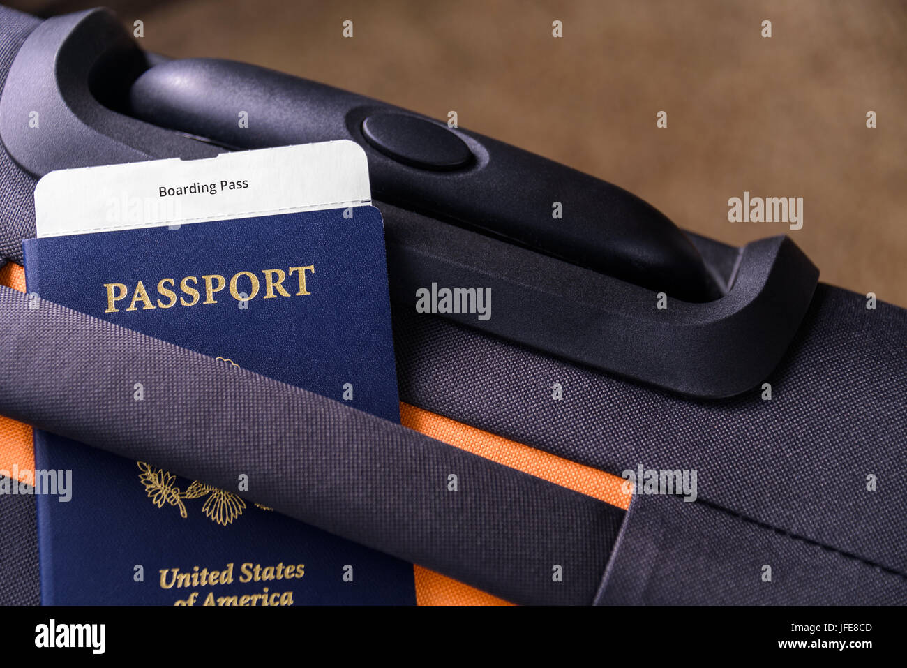 US passport and a boarding pass on a suitcase Stock Photo
