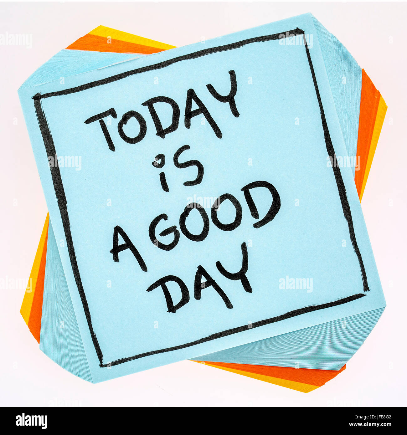 Today is a good day positive affirmation handwriting on an isolated sticky note Stock Photo