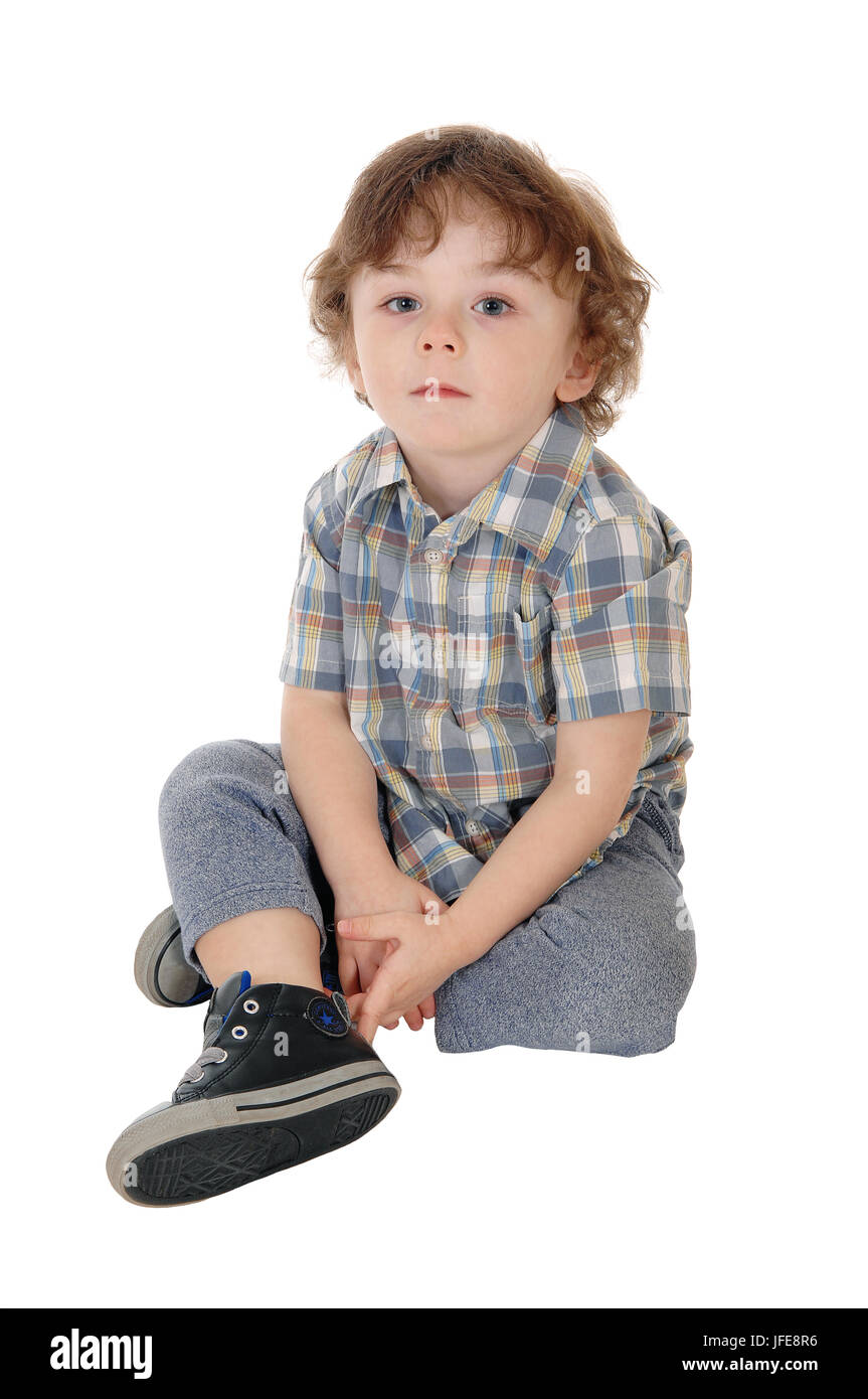 Little three year boy sitting on floor Stock Photo - Alamy