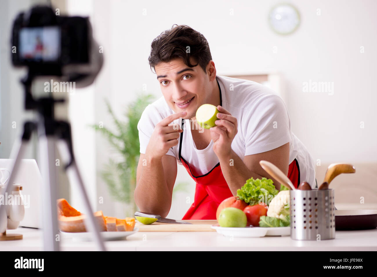 Food Blogger Photo Food blogger working in the kitchen Stock Photo - Alamy