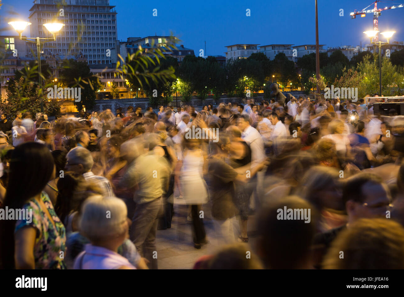 On summer nights Parisians learn and dance the tango. Stock Photo