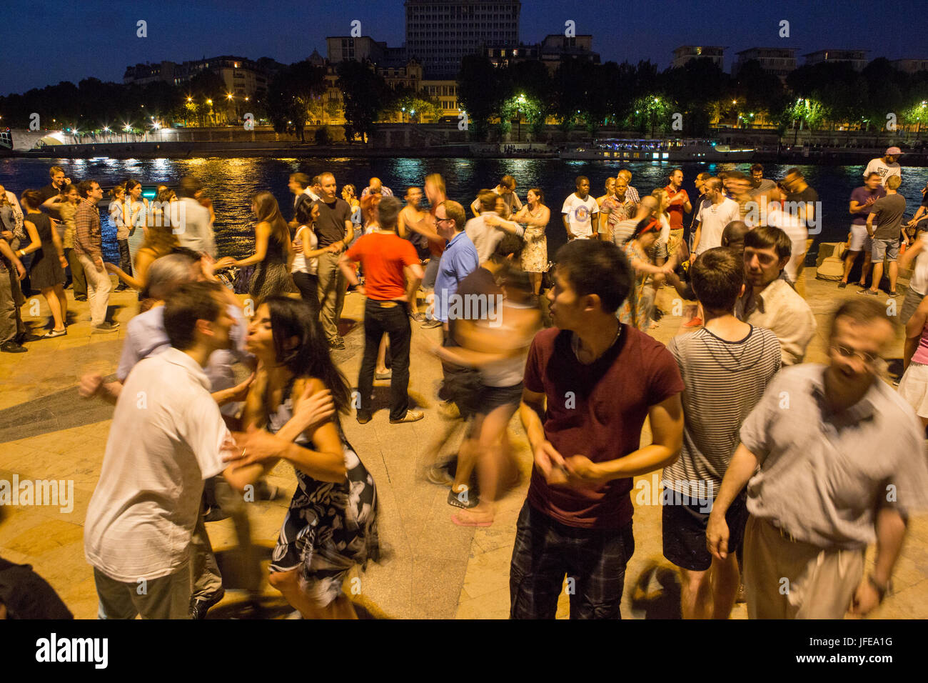 Paris Dancing Riverside On summer nights Parisians learn and dance the tango near the Seine ...
